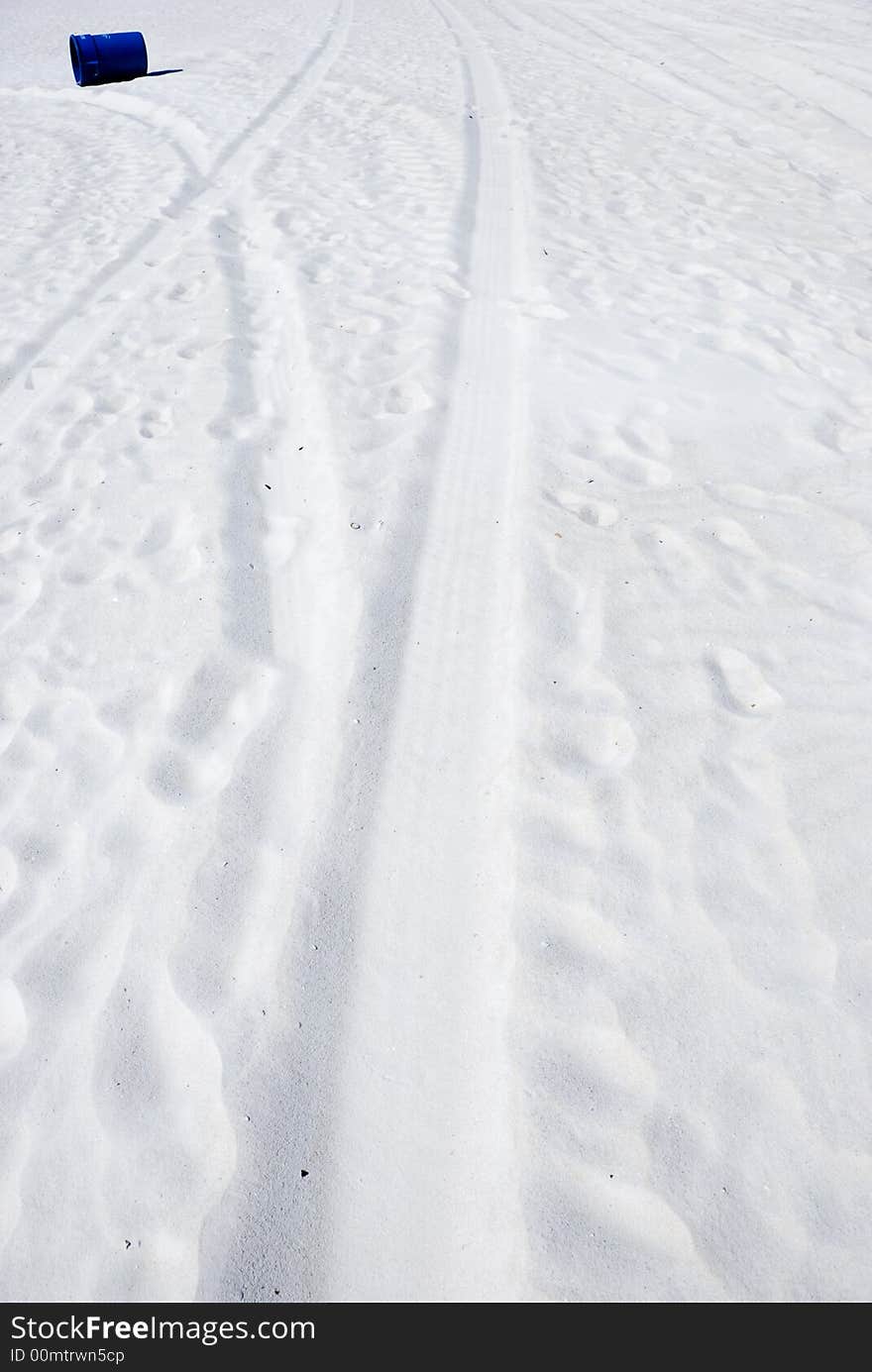 Picture of vehicle tracks embedded on the sand. Picture of vehicle tracks embedded on the sand