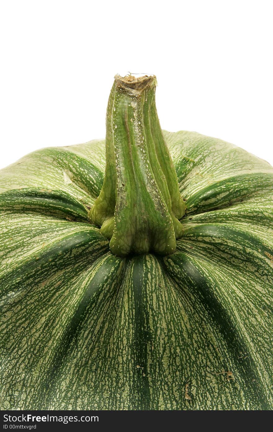 Green ripe pumpkin close-up isolated over a white background. Green ripe pumpkin close-up isolated over a white background