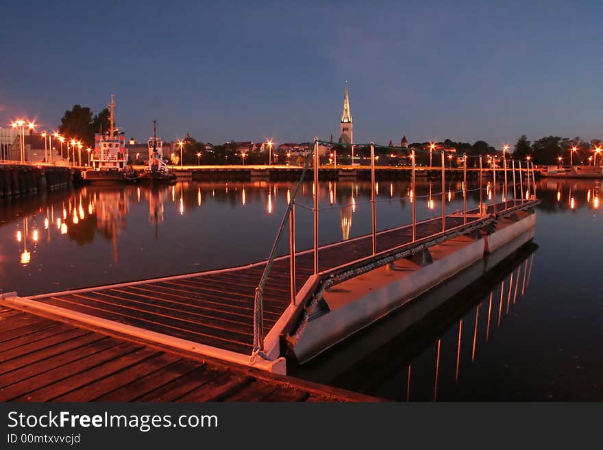 At night the old port - not a soul sleeps. At night the old port - not a soul sleeps