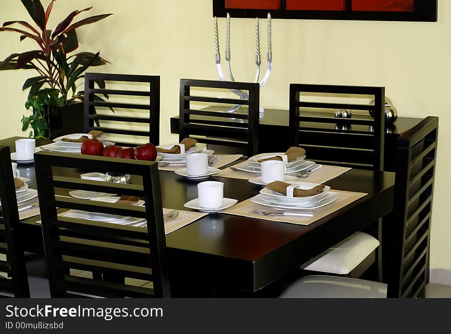 Contemporary diningroom set for a dinnerparty. Contemporary diningroom set for a dinnerparty