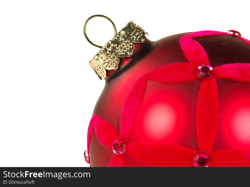 Trendy red christmas tree ornament leaning to one side. Trendy red christmas tree ornament leaning to one side