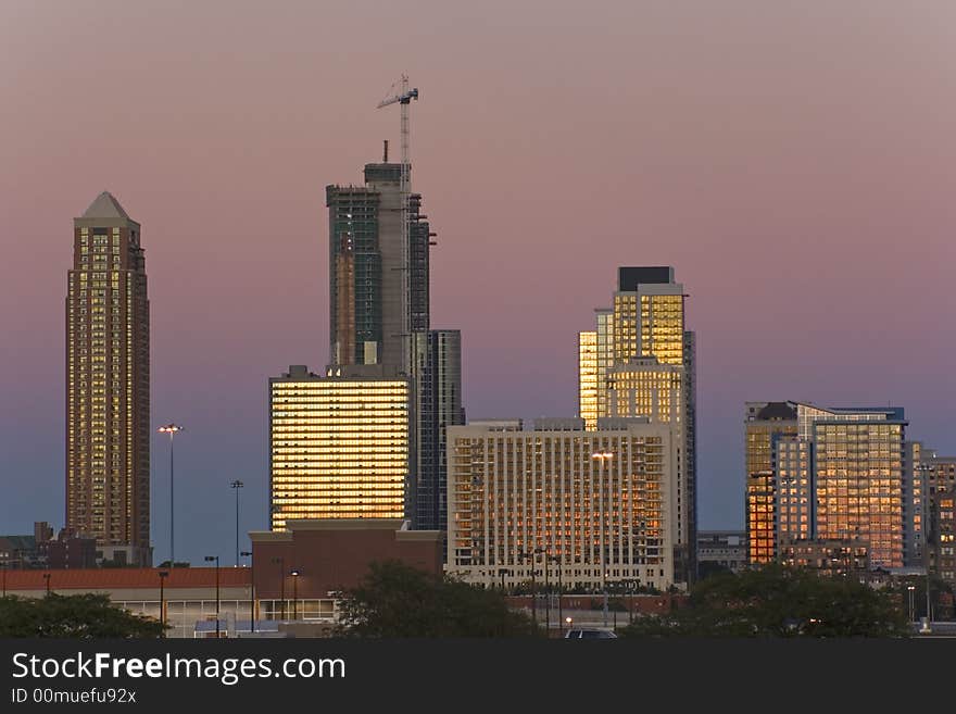 Colorful sunset -  new constructions in Downtown Chicago. Colorful sunset -  new constructions in Downtown Chicago