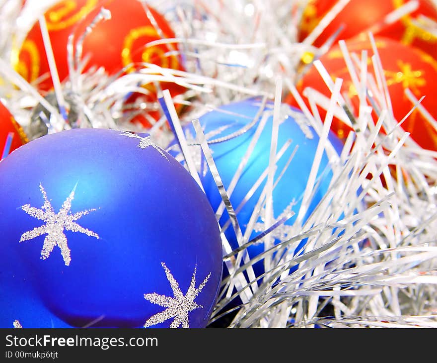 Blue and red decoration balls with silver tinsel