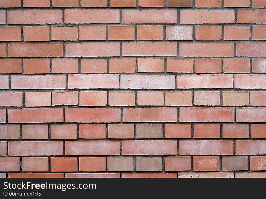 Wall of red bricks with cement layers. Wall of red bricks with cement layers