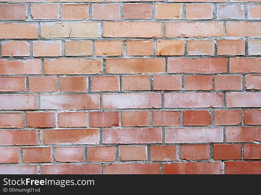 Wall of red bricks with cement layers. Wall of red bricks with cement layers