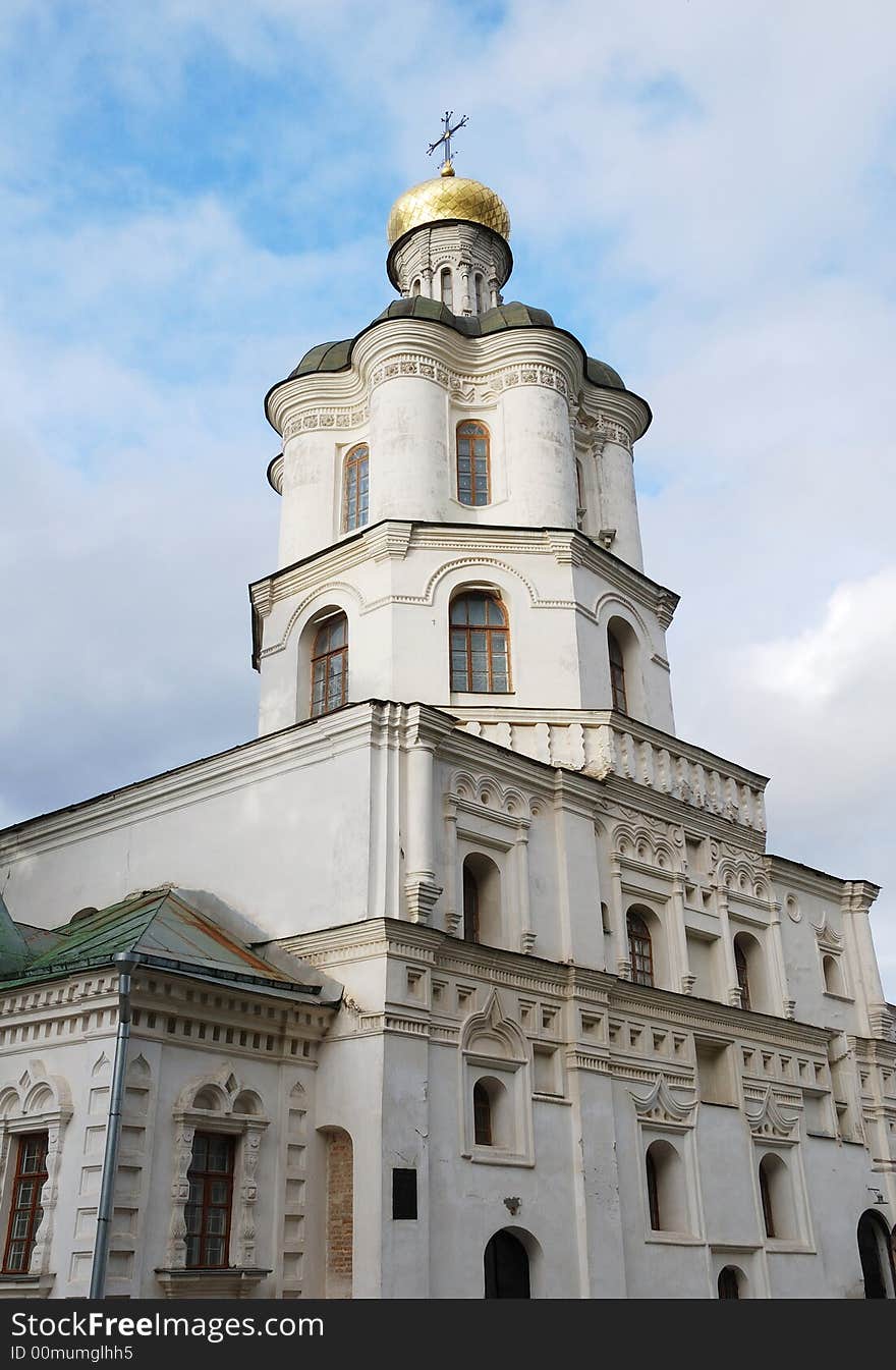 Collegium building with church in Chernigiv. Ukraine. Sky with clouds.