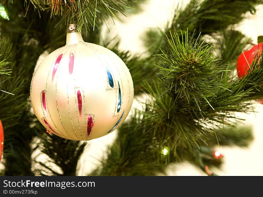 Glass ball hanging on christmas tree. Glass ball hanging on christmas tree