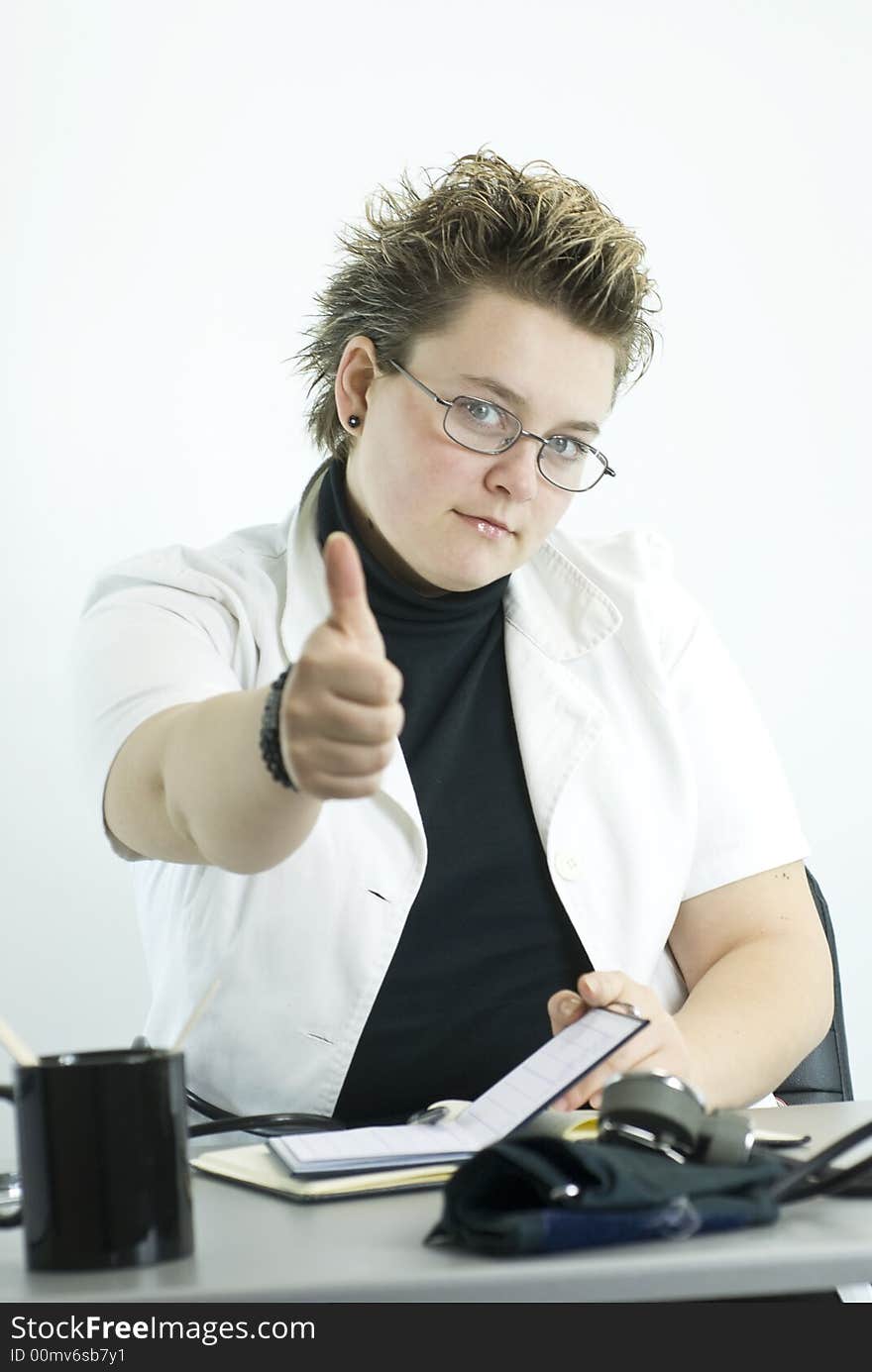 Female doctor showing thumbs up