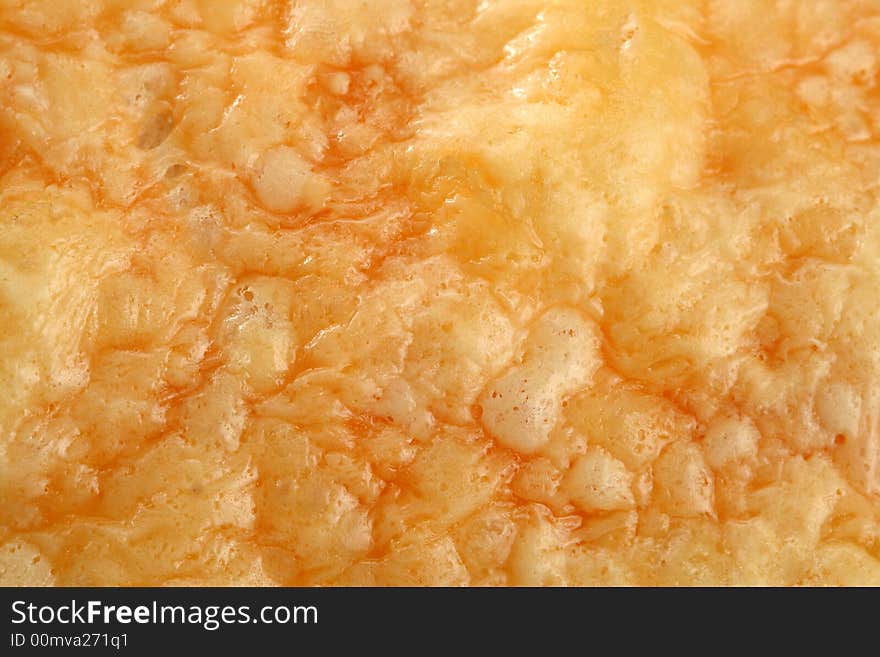 Fresh bread with a cheese crust, background