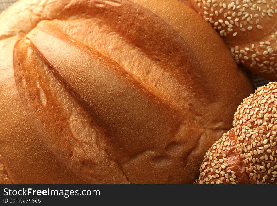 Various types of freshly baked bread, background. Various types of freshly baked bread, background