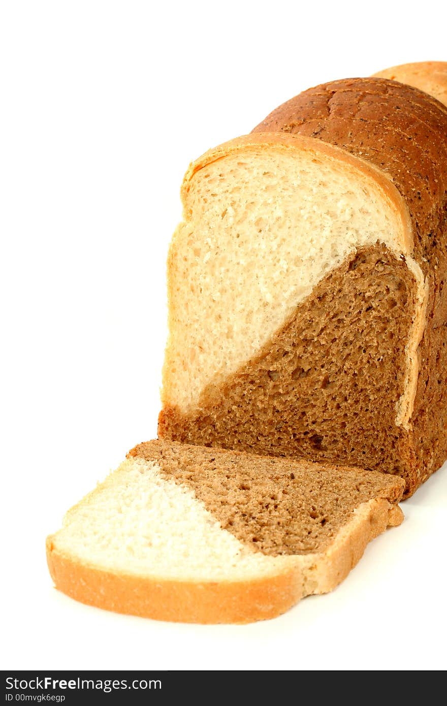 Loaf of multicoloured bread, isolated