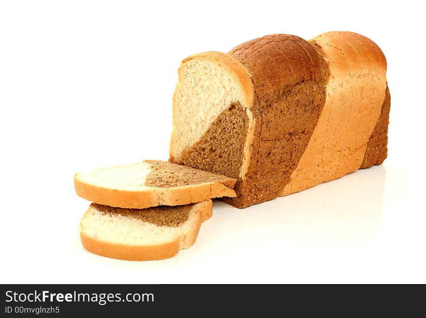 Loaf of multicoloured bread, isolated