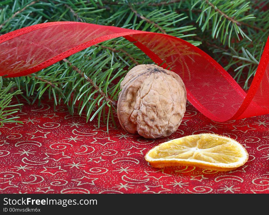 Christmas still life with red ribbon