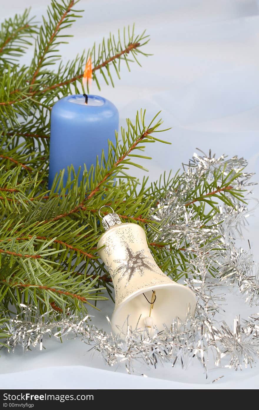 Christmas still life with blue candle