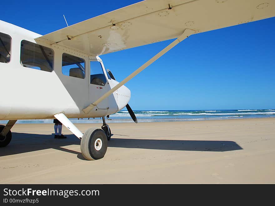 Light Aircraft On Beach