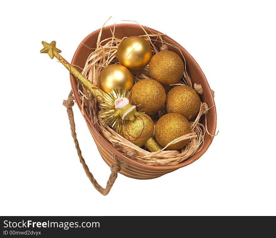 Basket with gold eggs and a New Year's toy. Basket with gold eggs and a New Year's toy