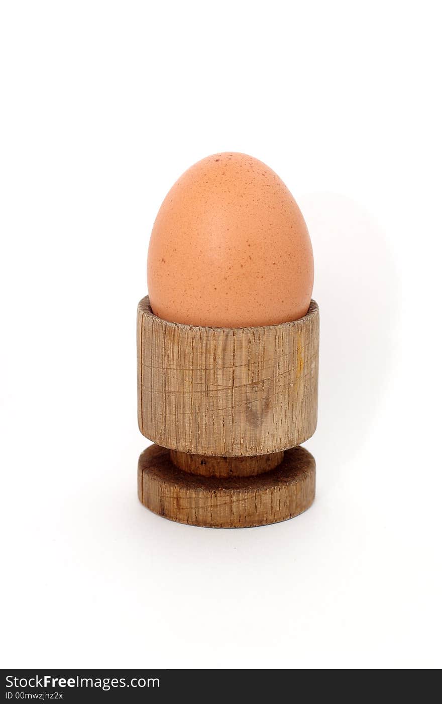 Egg in a wooden stand