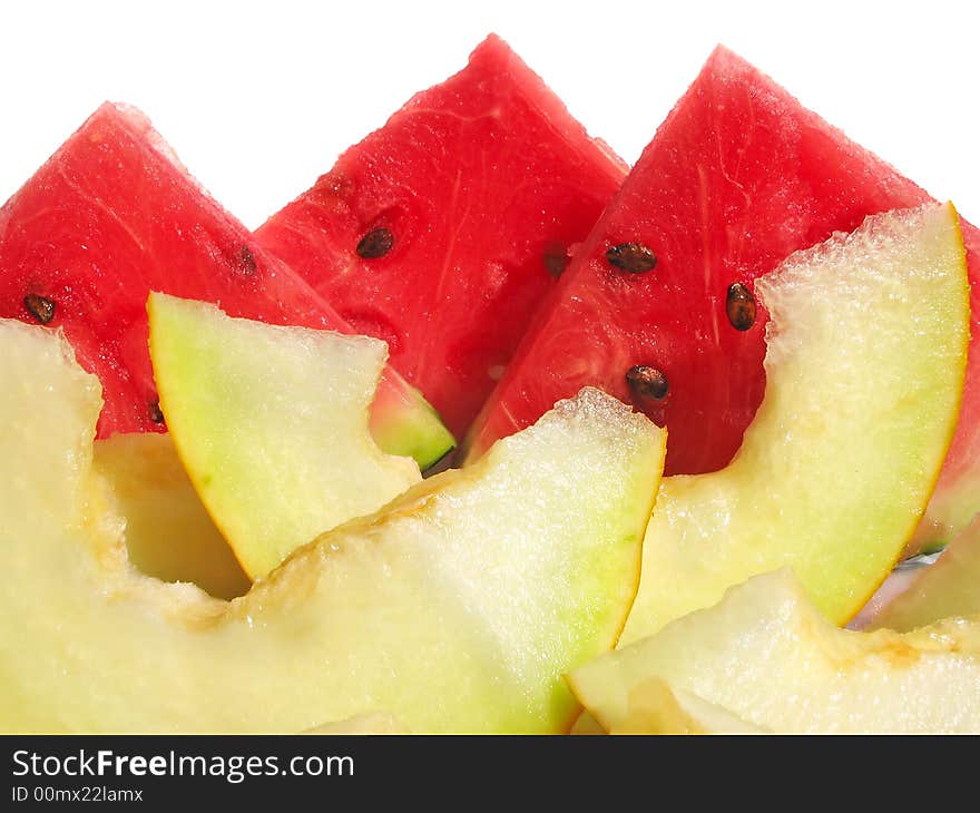 Slices of watermelon and muskmelon isolated on white