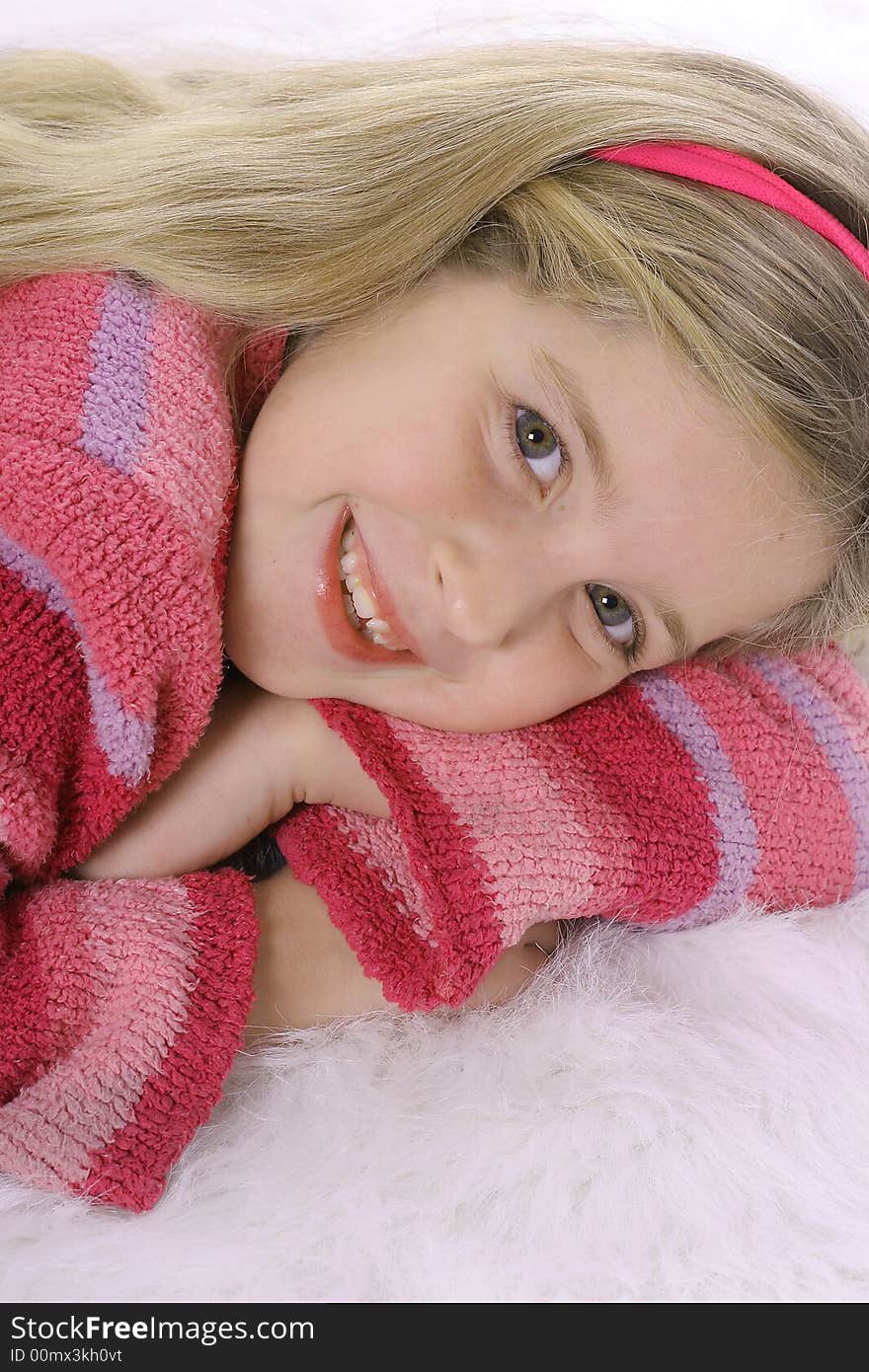 Gorgeous child in a pink sweat