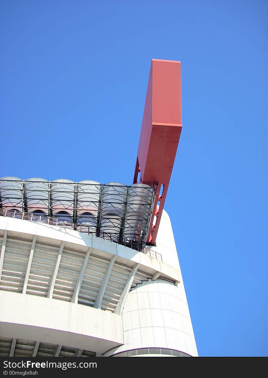 A part fo the San Siro stadium in Milan under a blue sky. A part fo the San Siro stadium in Milan under a blue sky