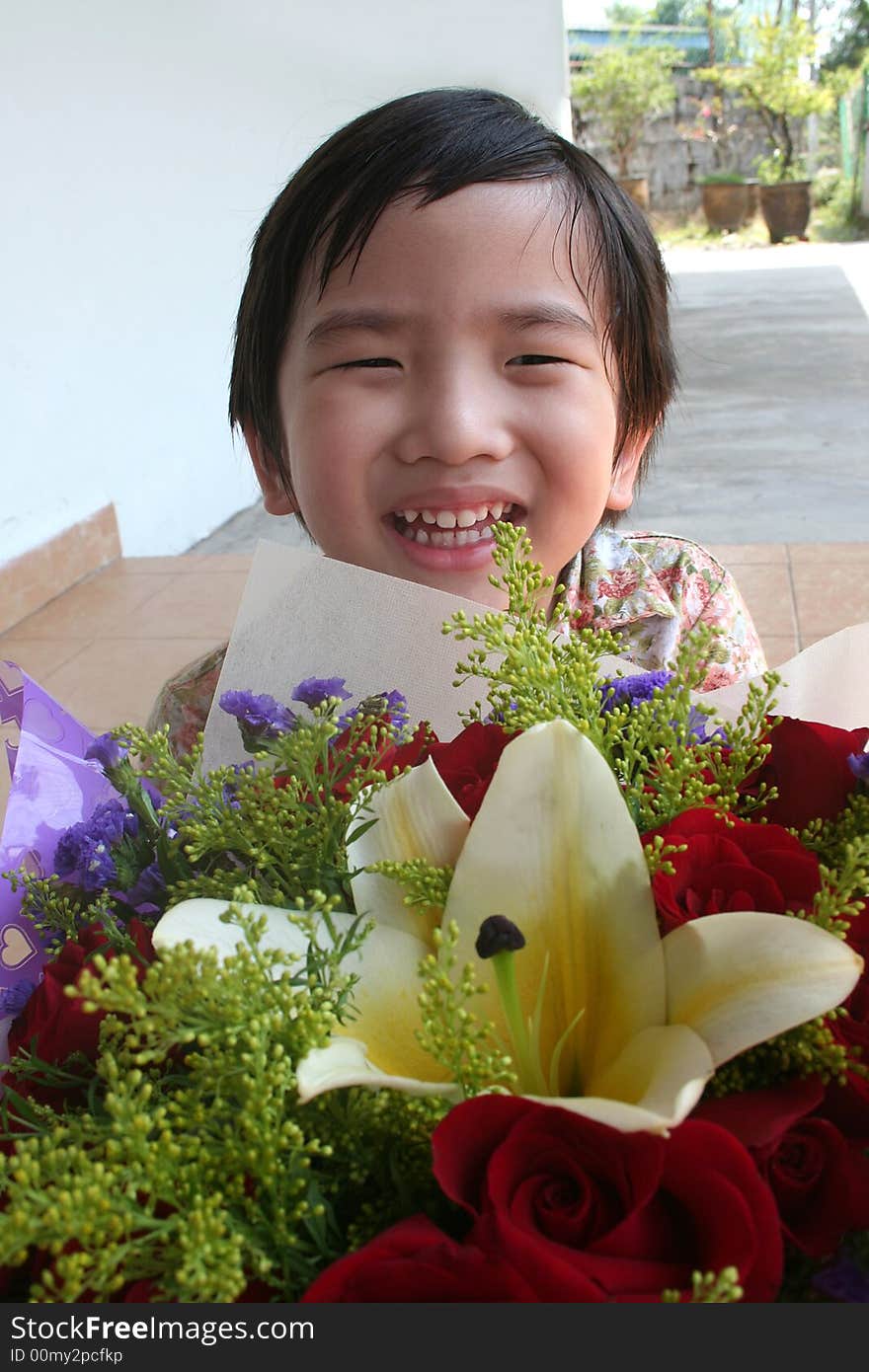 Boy holding bouquet