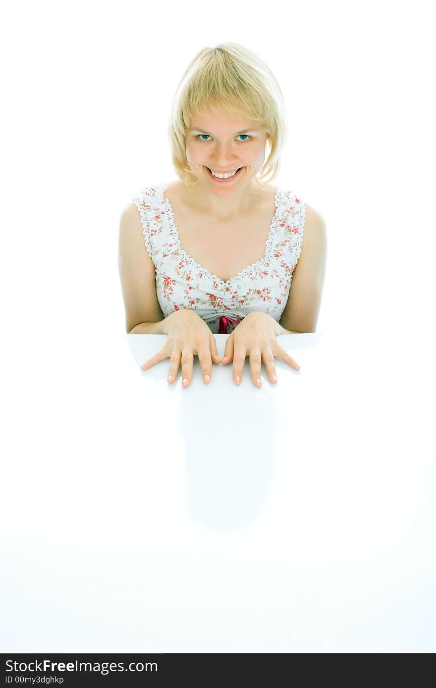 Beauty woman sit on the table over white background