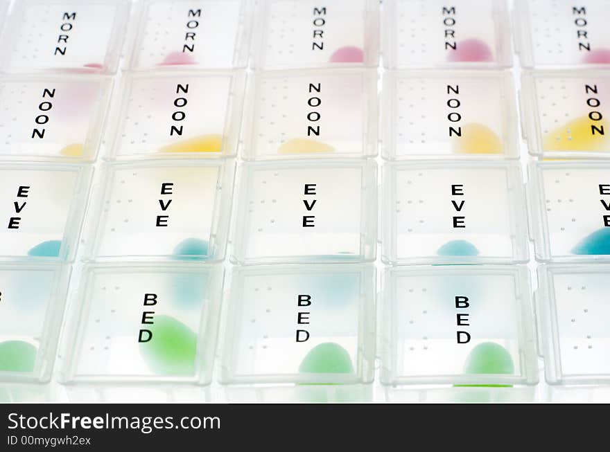 Pill boxes fill with jelly beans. Pill boxes fill with jelly beans