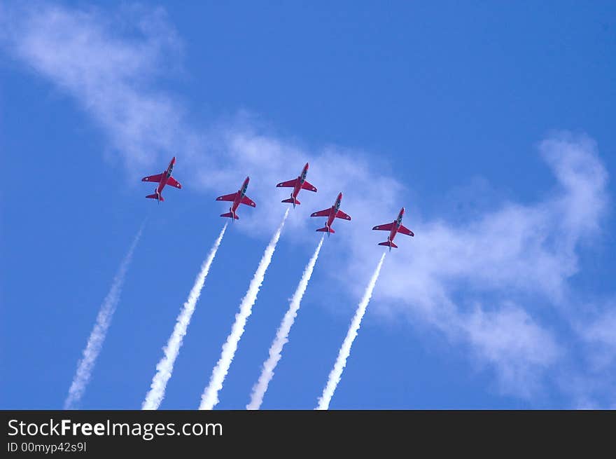 Five member of the red arrow taking a maneuver for their aerobatic show. Five member of the red arrow taking a maneuver for their aerobatic show