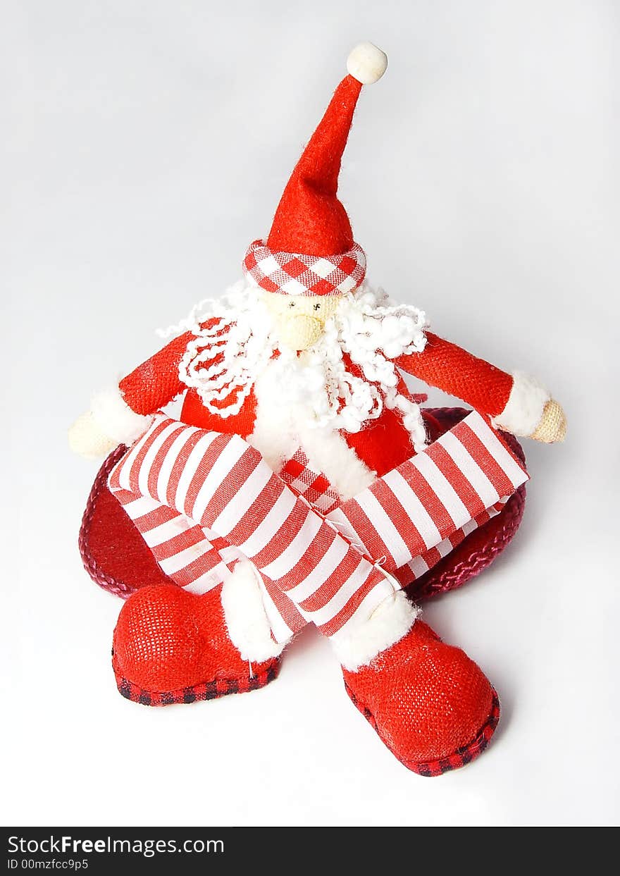 Sitting santa claus toy with l