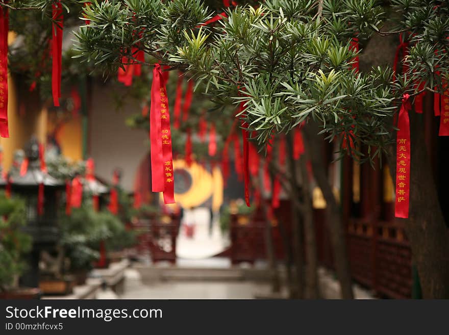 Chinese Red Ribbons on Trees in Buddha Temple