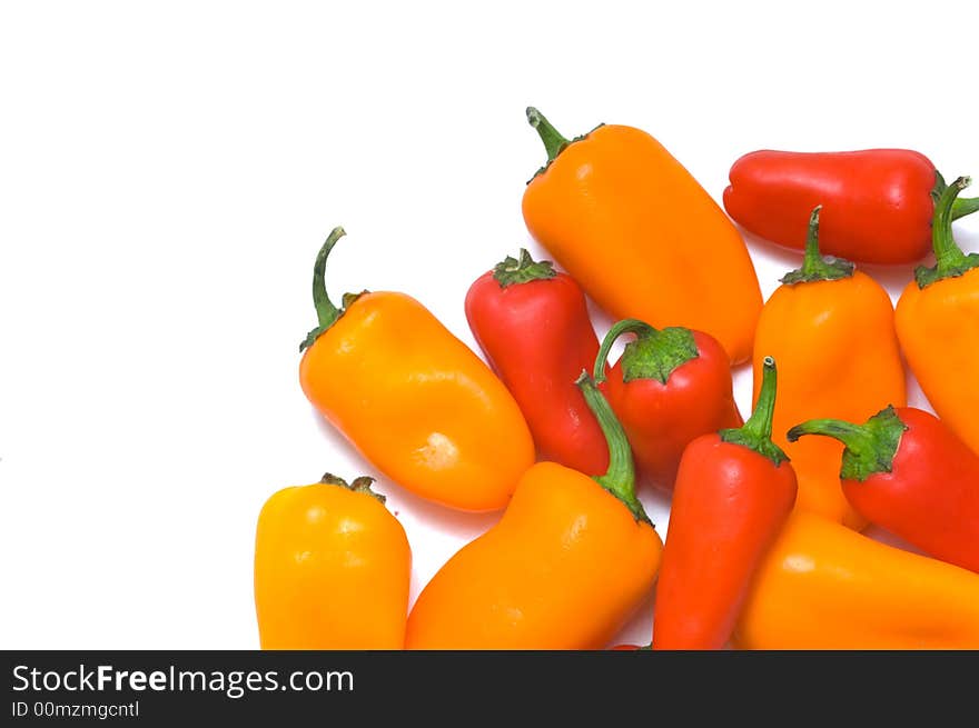 Fresh sweet peppers on white background, with copy space