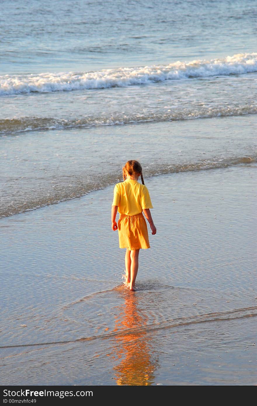 Little girl walking on the water