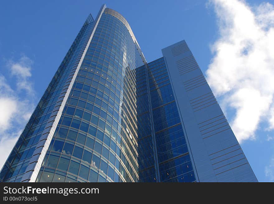 Skyscraper on the blue sky background