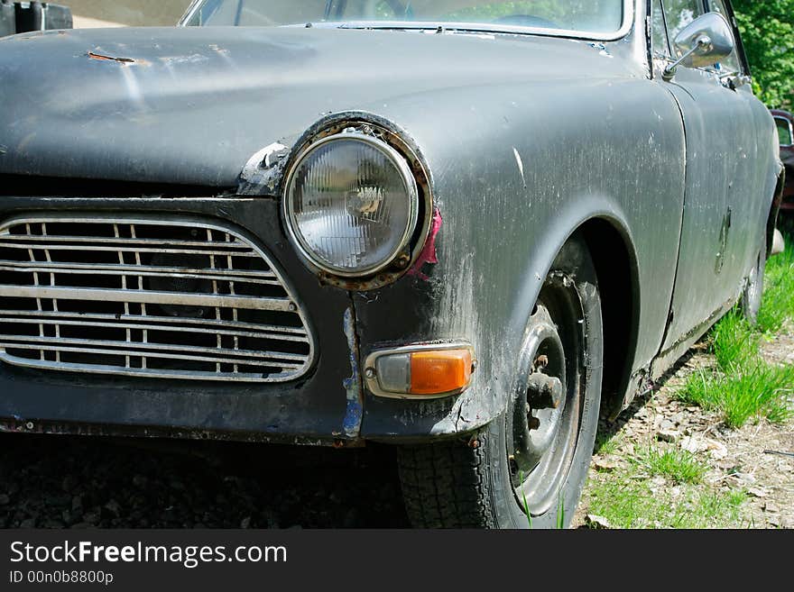 Vintage abandoned Volvo Amazon on junkjard