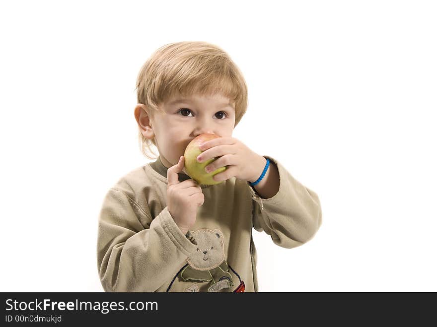 Young girl is eating apple