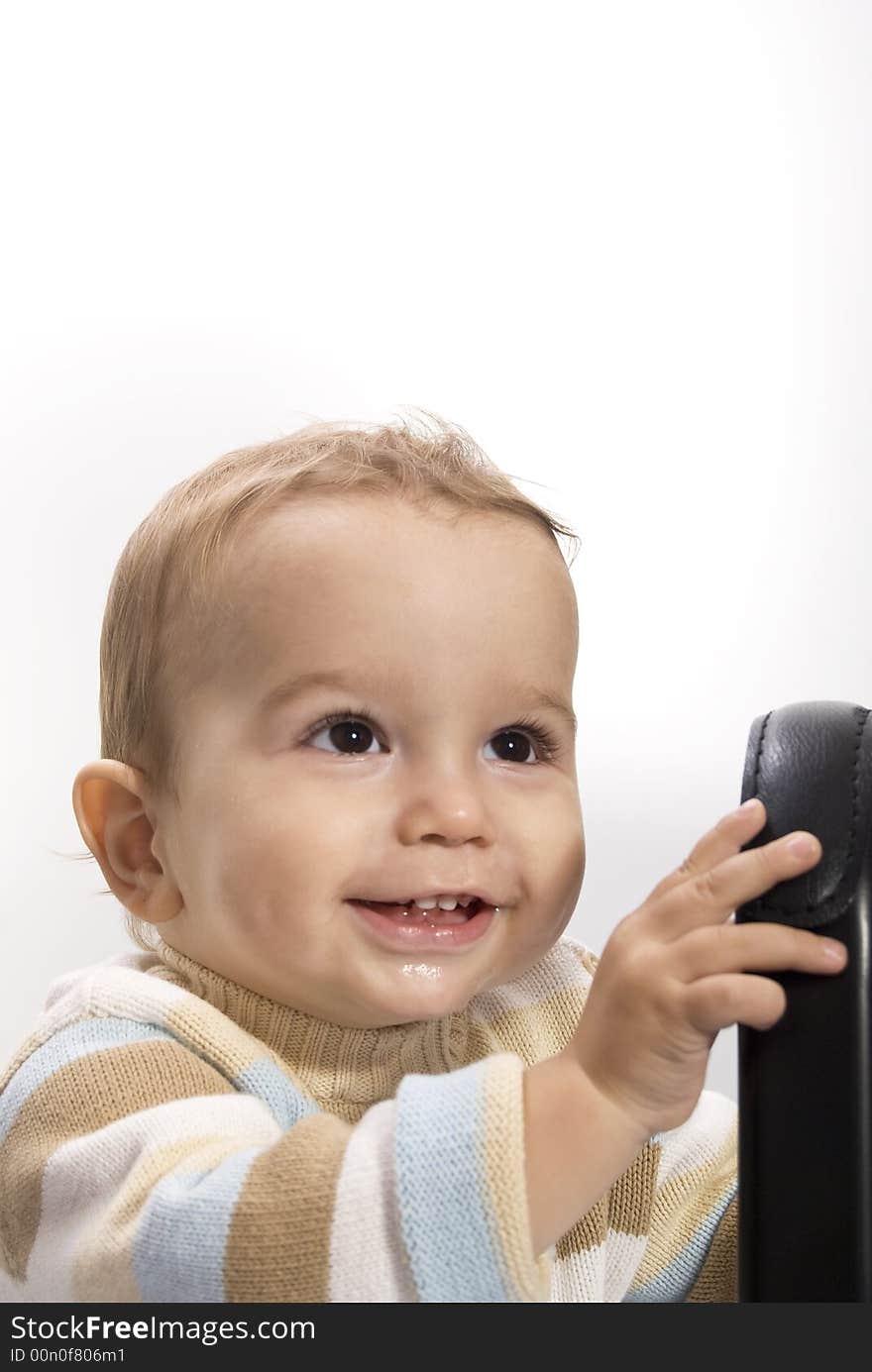 Young boy standing and smiling. Young boy standing and smiling