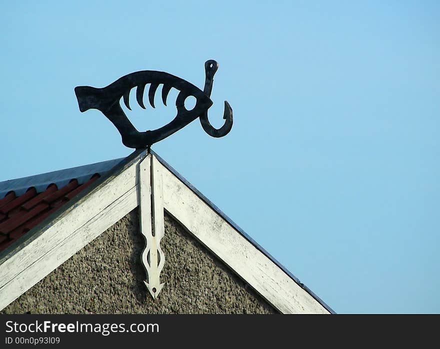 Fish shaped weather-vane in fishermen village Nida at Lithuania