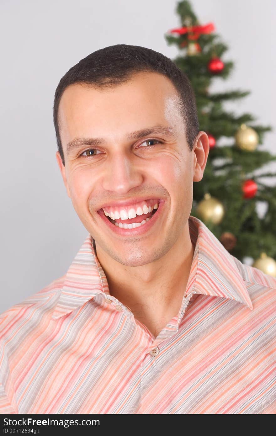 portrait of happy young man for christmas