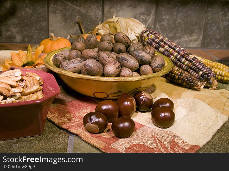 Colorful bowls of shelled and unshelled pecans. Colorful bowls of shelled and unshelled pecans