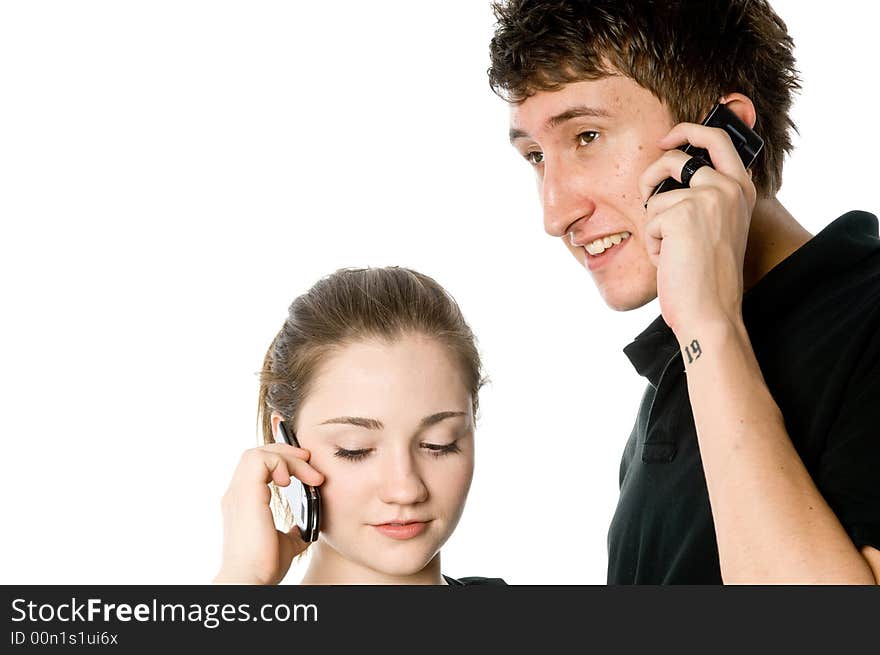 A young couple on the phone together. A young couple on the phone together