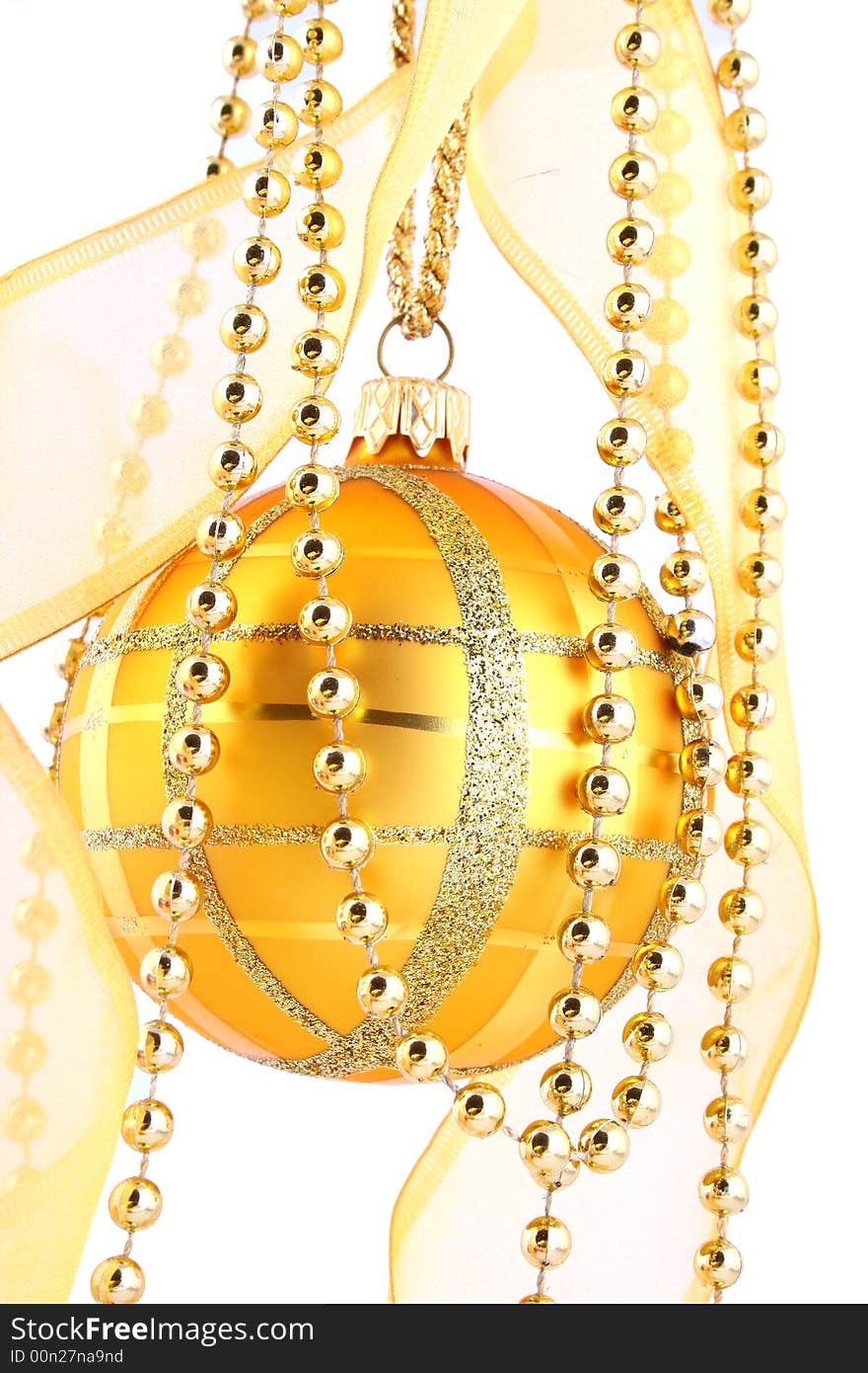 Golden decorative Christmas bauble isolated on white. Golden decorative Christmas bauble isolated on white