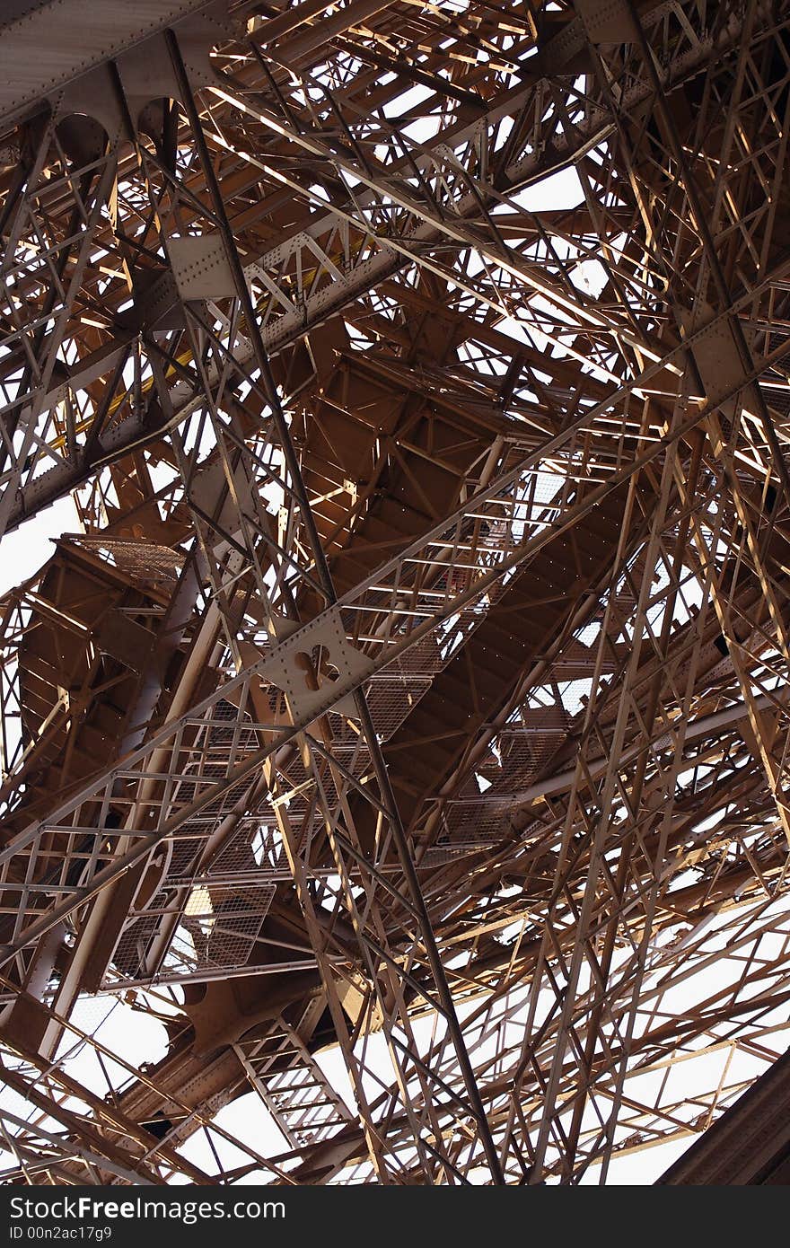 Detail view of the structure of the Eiffel Tower in Paris. Detail view of the structure of the Eiffel Tower in Paris.