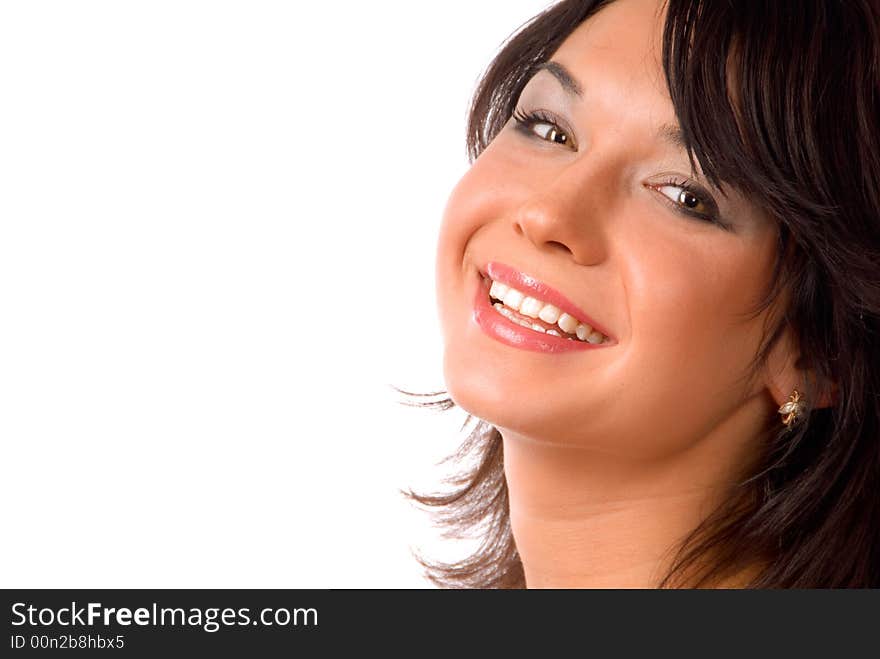 Smiling brunette with white even teeth on the white background. Smiling brunette with white even teeth on the white background