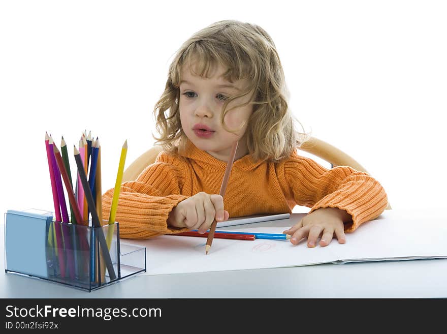 Beautiful little girl with pencils