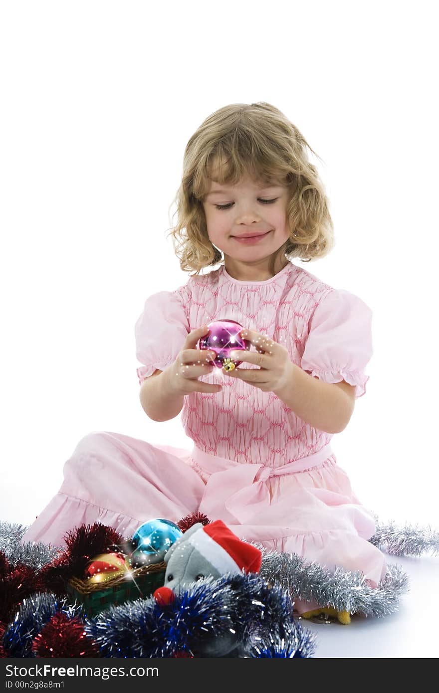 Beautiful little girl with christmas decoration on isolated background