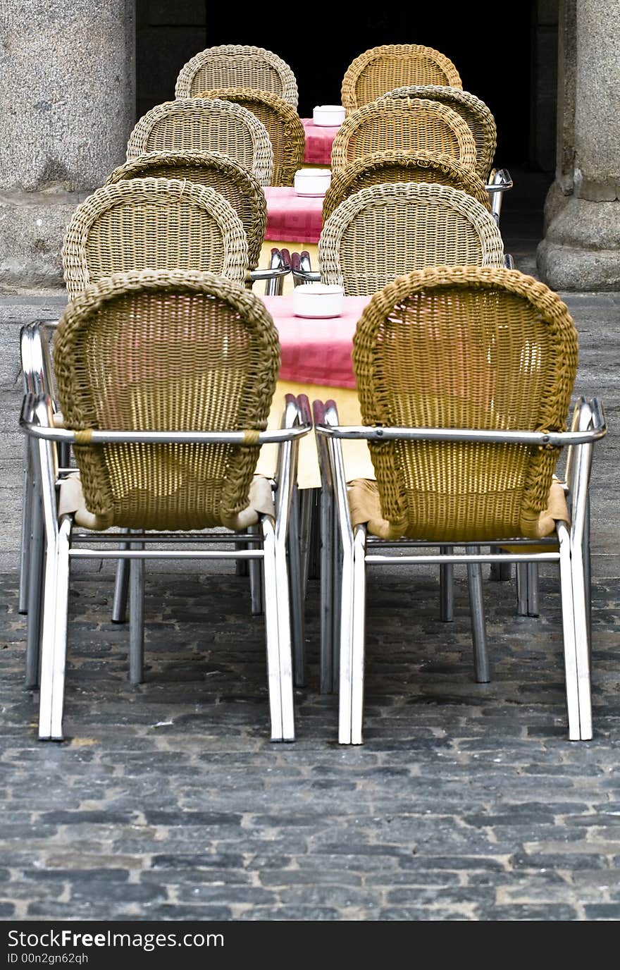 Empty chairs and empty glasses.