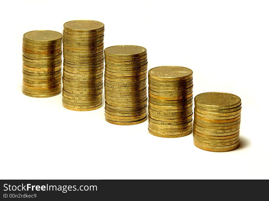 Columns of golden coins against a white background