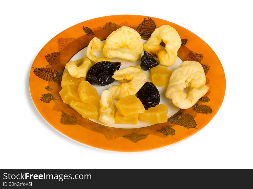 Dish of dried fruits, isolated on white background