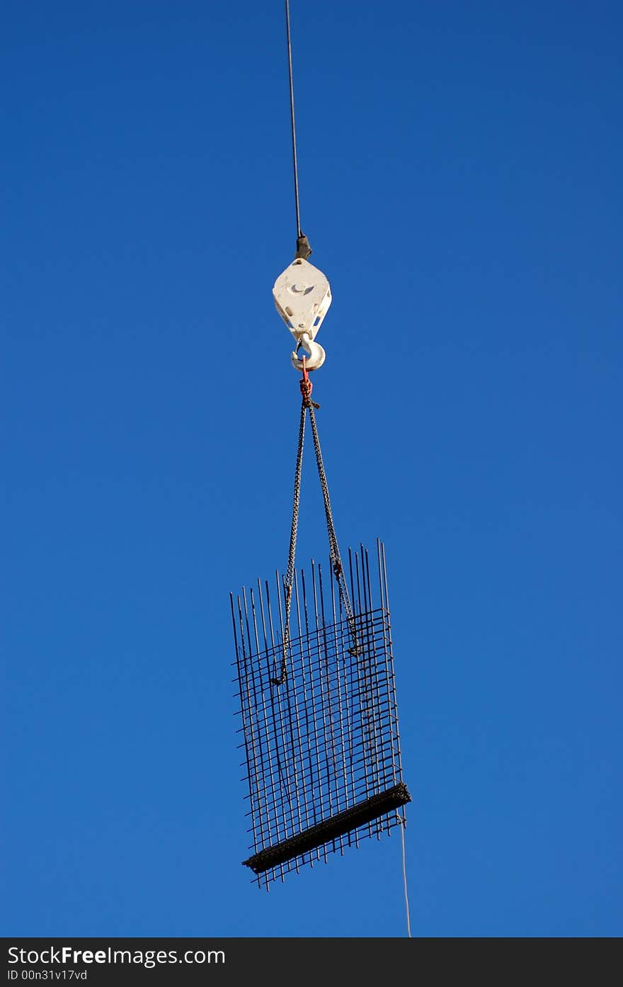 Loaded construction crane at a building site