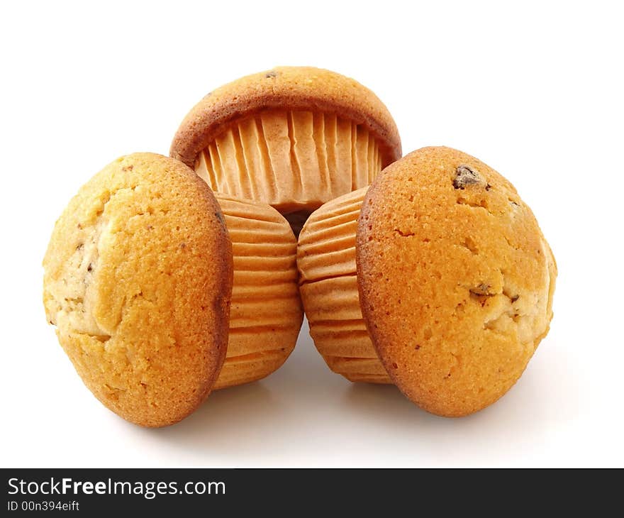 Muffins with chocolate filling isolated on white background